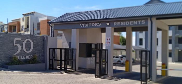 2-Bedroom Apartment For Sale in Carlswald with pool, security, and balcony access.