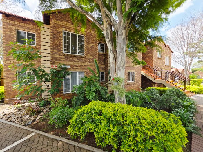 For Sale: Equestria Townhouse with 3 beds, garage, pool, and included appliances.