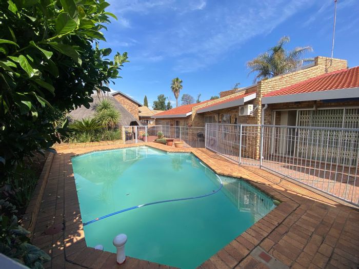 Spacious 7-bedroom house with pool, Lapa, and ample parking in Vanderbijlpark Se 3. For Sale.