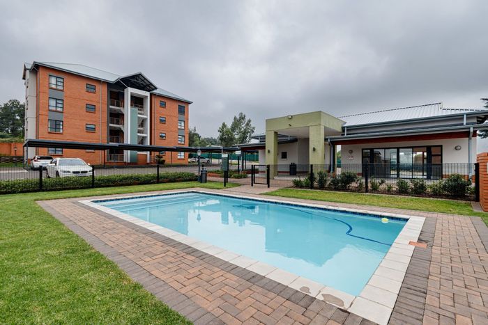 For Sale: 2-bedroom apartment in Founders Hill with pool, braai area, and security.