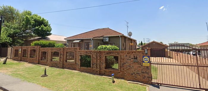 For Sale: Spacious 4-bedroom house in Primrose East with pool, cottage, and security.