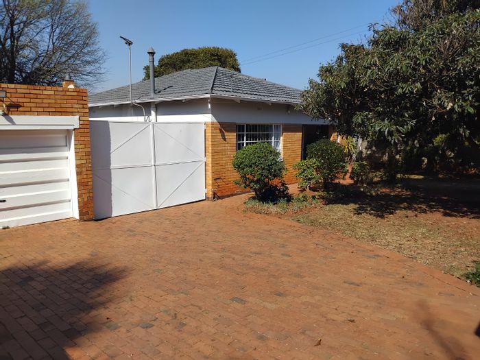 3-Bedroom House For Sale in Primrose Hill with double garage and security features.