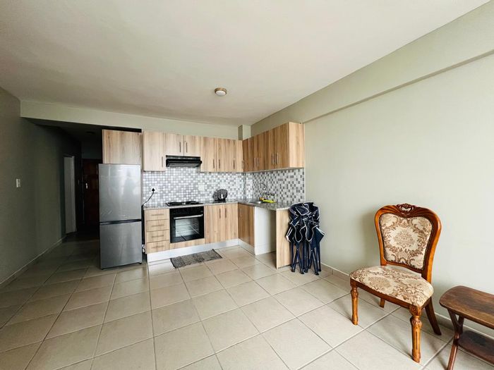 South Beach Apartment For Sale: 2 Bedrooms, beach access, secure complex, open-plan living.