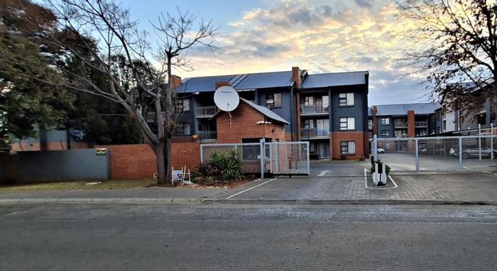 For Sale: Apartment in Jansenpark with private patio, communal gardens, secure parking.