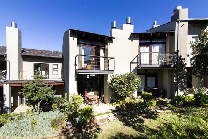 Oubaai Apartment For Sale: 2-bed duplex, garage, patio, fiber internet, coastal access.