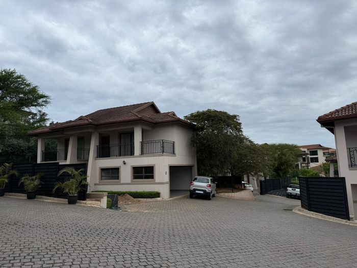 3 Bedroom townhouse to rent in Izinga with pool, garage, and security features.