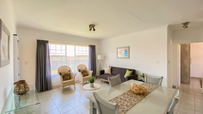 3-Bedroom Townhouse To Rent in Monavoni, featuring private garden and security estate.