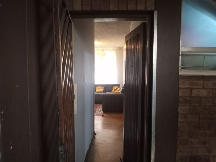 For Sale: Apartment in Pretoria West, 3 bedrooms, balcony, close to amenities.