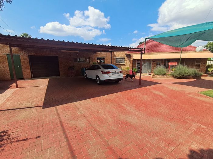 Spacious 3-bedroom house with flatlet and large yard in Stilfontein Central, For Sale.