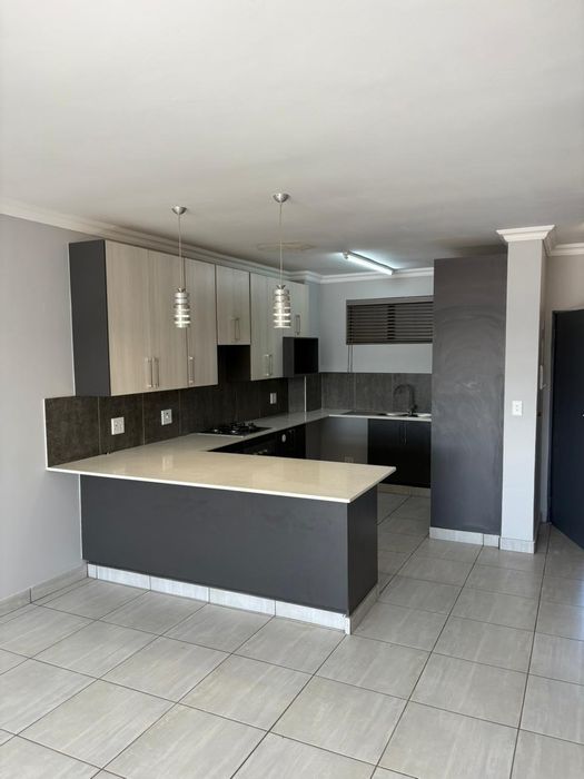 2-bedroom apartment in Melodie to rent, features braai room and communal pool.