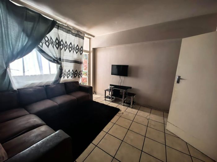 South Beach Apartment For Sale: Spacious living, close to beach and amenities.