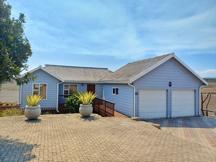Coastal house in Reebok for sale, featuring dual-living and mountain views.