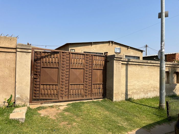 Thulani House For Sale: 2 beds, lounge, kitchen, walled yard, near transport and schools.