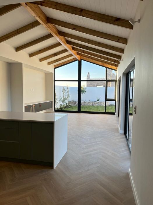 House For Sale in Sandown: 4 beds, 3 baths, outdoor living, secure community.