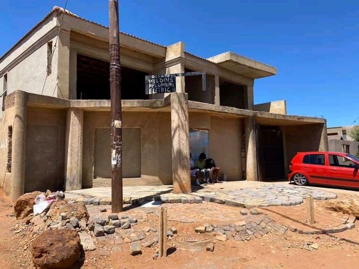 For Sale: House in Protea Glen with 4 bedrooms, garage, and investment potential.