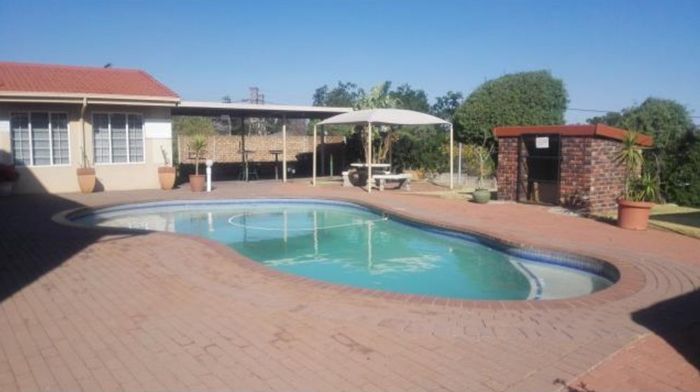 For Sale: 2-Bedroom Apartment in Primrose Hill with pool, braai area, and secure parking.