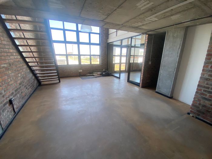 306m2 Commercial Space to Rent in Woodstock, featuring open plan layout and security.