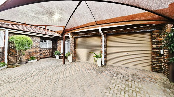 Three Rivers Townhouse For Sale: Spacious 3-bed unit with double garage, private patio.