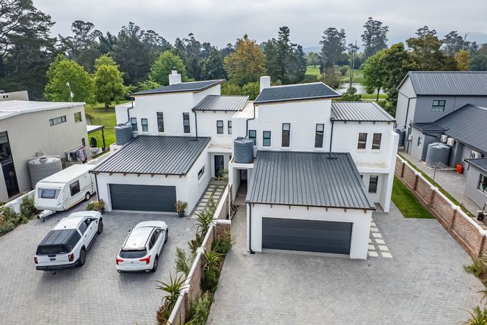 For Sale: House in King George Park with garden, garage, and golf course views.