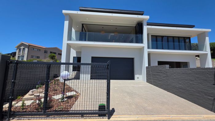 For Sale: House in Hartenbos Heuwels with river, mountain, and ocean views.