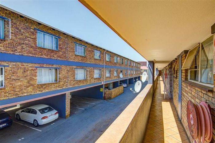 For Sale: Apartment in Kempton Park Central with 2 bedrooms, carport, and functional layout.