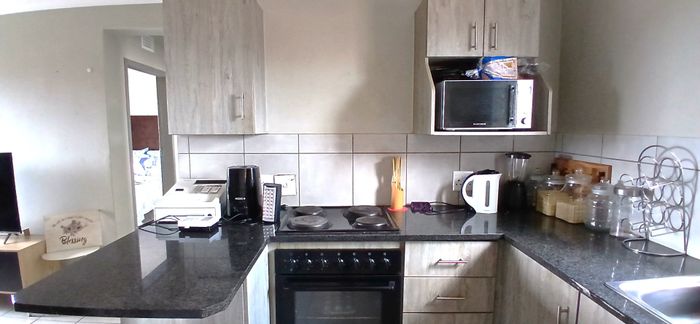 2-Bedroom Apartment For Sale in Heuweloord with balcony and parking options.
