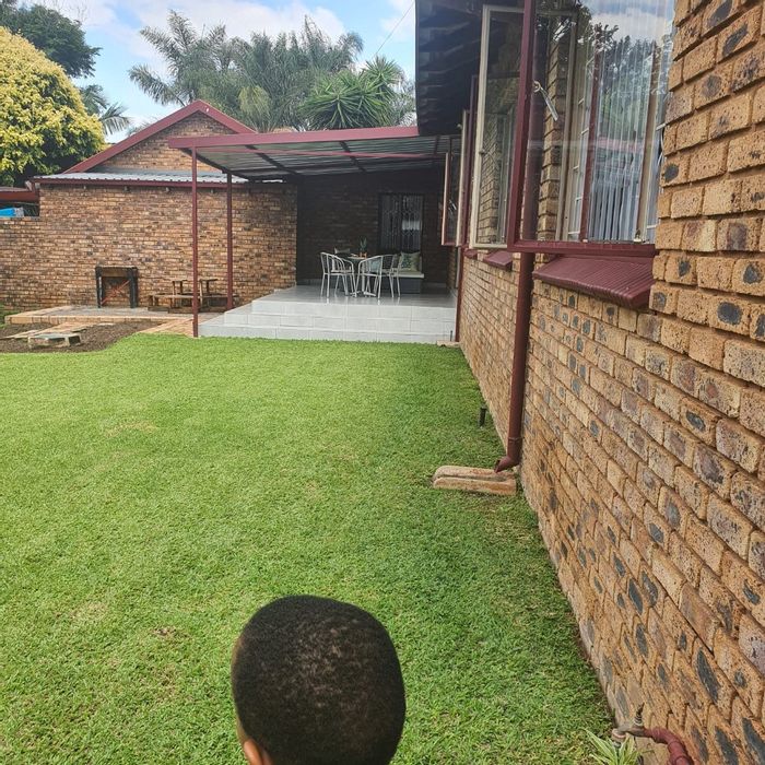 3-Bedroom House To Rent in Pretoria North with garden, secure parking, and open-plan living.