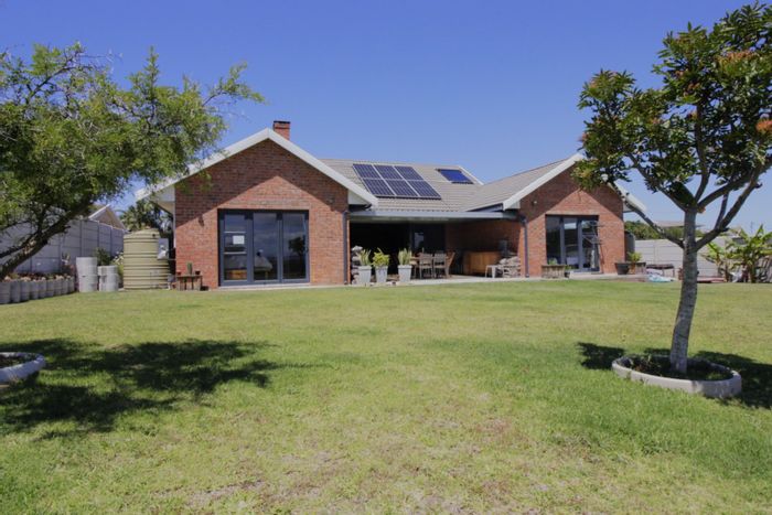 For Sale: House in Paradise Beach with guest suite, solar panels, and ocean views.