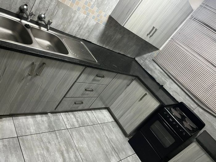 For Sale: 2-Bedroom Apartment in Sunnyside with secured building and spacious living area.