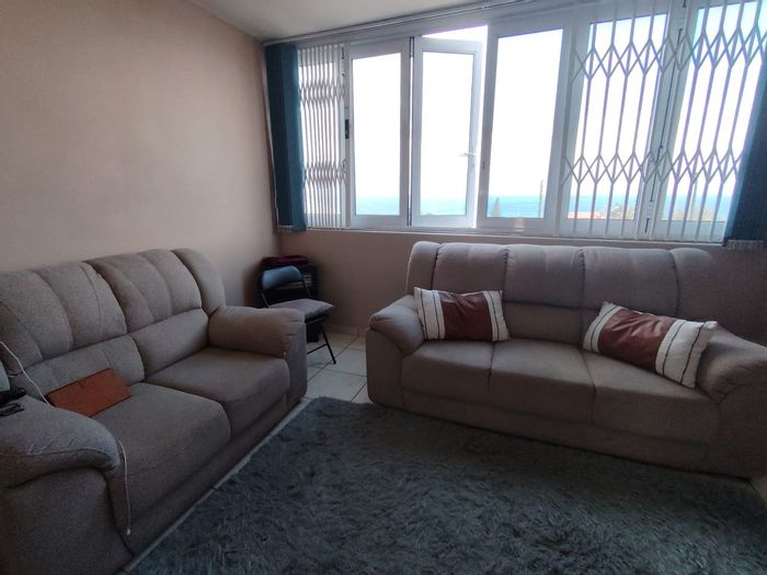 Uvongo Apartment For Sale: 2 Bedrooms, beach access, en-suite, close to amenities.