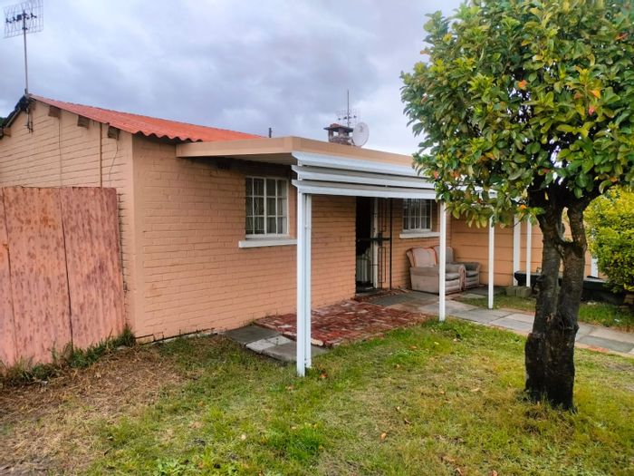 Two-Bedroom House For Sale in Bridgetown with garden and renovation potential.