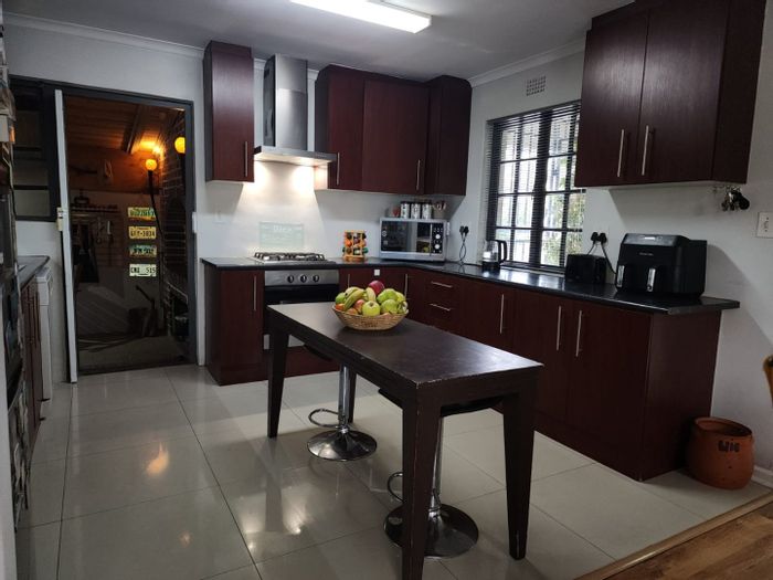 For Sale: Loucharmante House with dual homes, pool, security, and rental income.