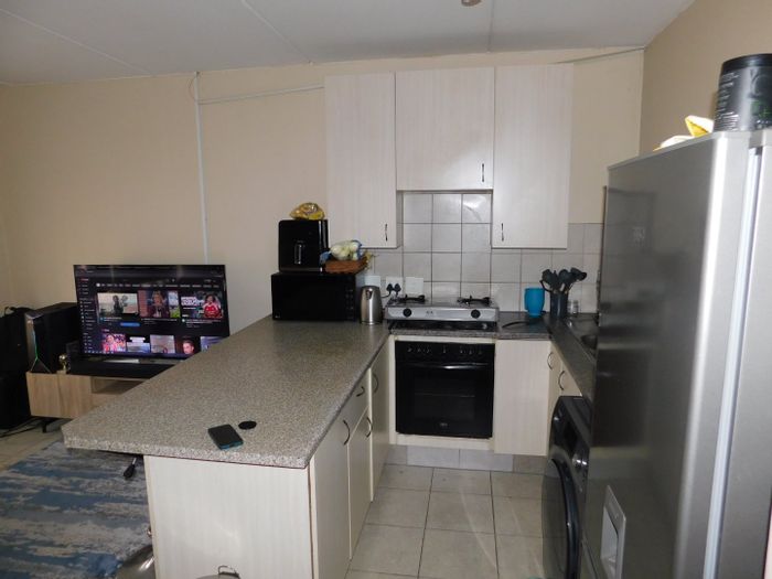 For Sale: 1-Bedroom Apartment in Grand Central with security, parking, and fiber-ready.