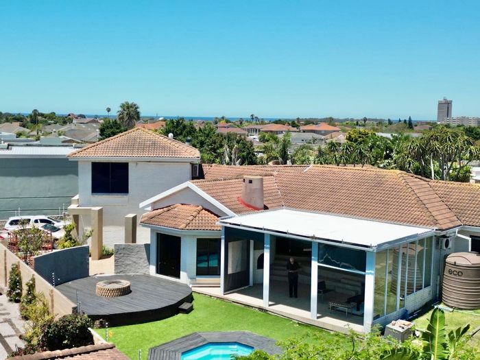 For Sale: Spacious 5-bed house in Summerstrand with pool, braai, and work area.