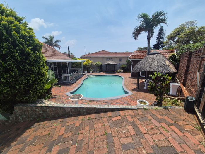 Brighton Beach House For Sale: Pool, entertainment room, spacious backyard, and ample parking.