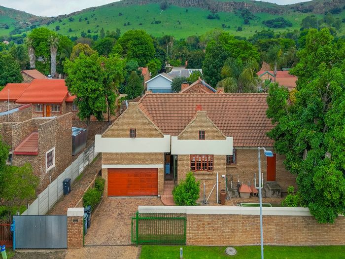 For Sale: Suiderberg House with pool, lapa, and versatile loft space.