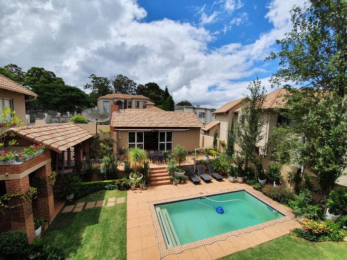 For Sale: House in Waterkloof Ridge with pool, outdoor entertainment, and study space.