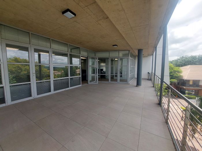 For Sale: Commercial office in Bryanston with balconies, parking, and backup utilities.