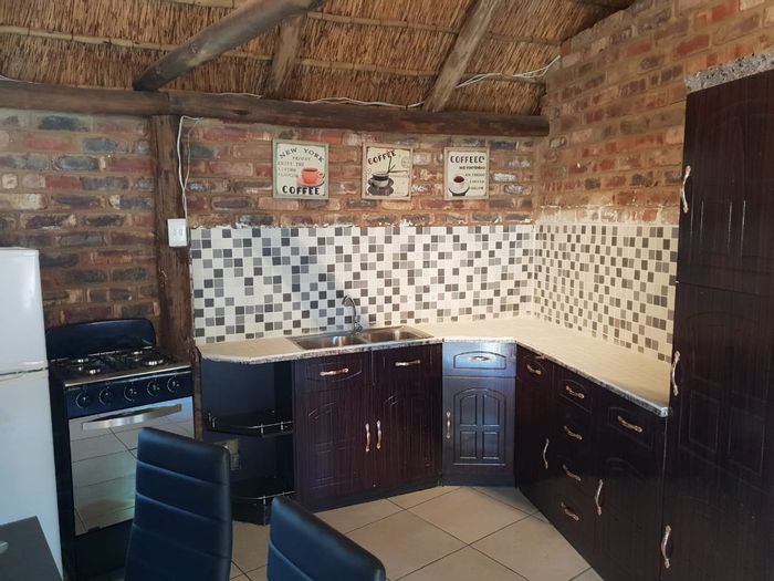 For Sale: House in Orkney Rural with riverside access, four bedrooms, indoor braai.