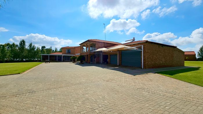 For Sale: 7.4-hectare farm in Oranjeville Central with dam views, amenities included.