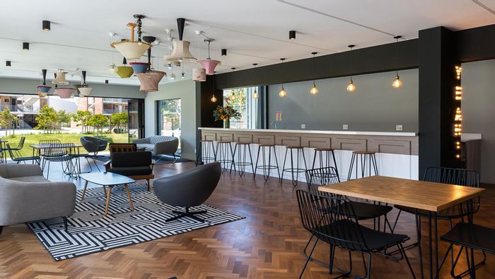 For Sale: 2-bedroom apartment in Ottery with secure carport and open-plan living.