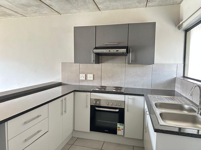 For Sale: Ground-floor apartment in Jansenpark, 2 beds, open-plan living, secure complex.