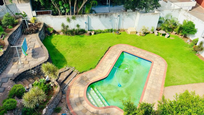 Bulwer Apartment For Sale: Rooftop courtyard, private pool, spacious living areas.