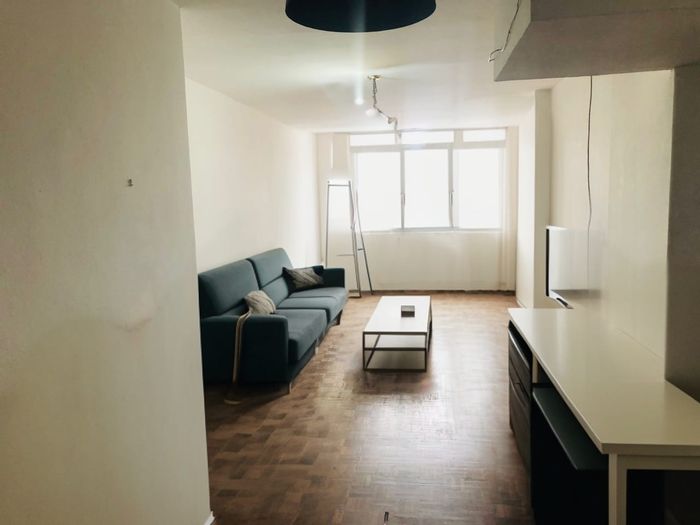 North Beach Apartment For Sale: Spacious living, secure garage, lift access, beach nearby.