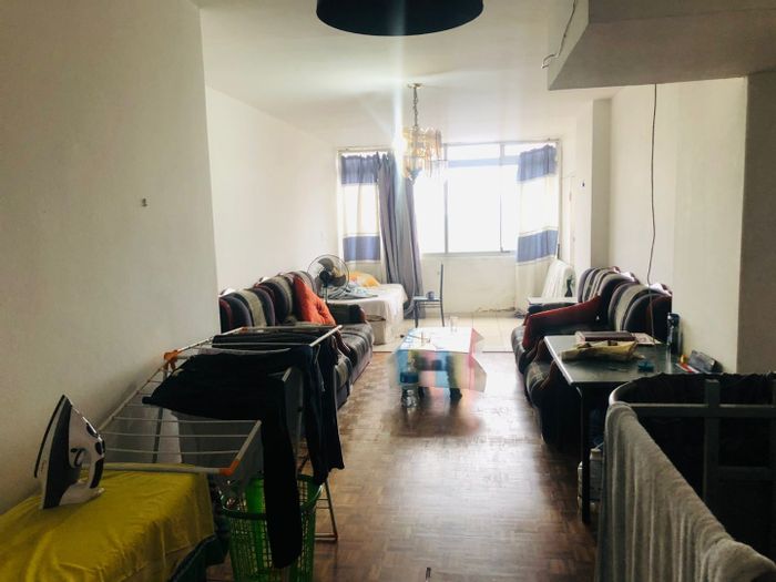 North Beach Apartment For Sale: Spacious flat with secure garage and lift access.