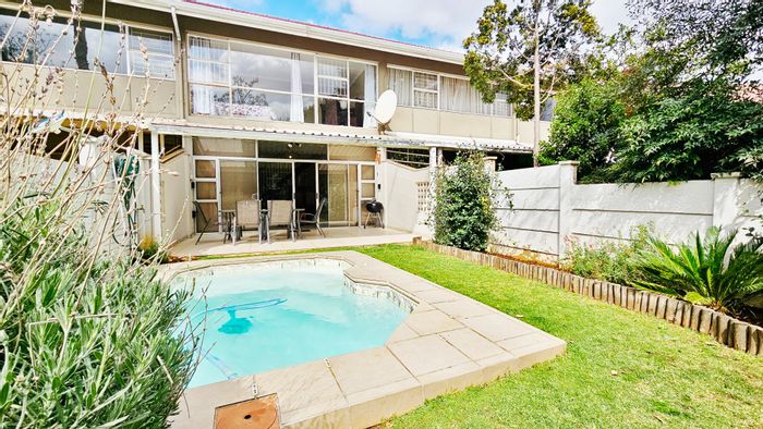 For Sale: Three Rivers Townhouse with private garden, pool, and furniture included.