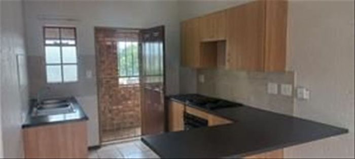 For Sale: Apartment in Hughes with 2 bedrooms, secure carport, and practical layout.