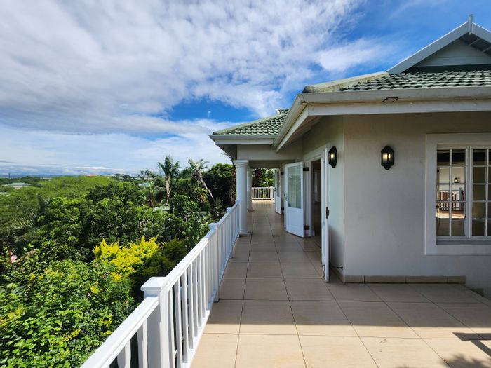 For Sale: House in Mount Edgecombe Country Club Estate with 4 bedrooms, double garage.