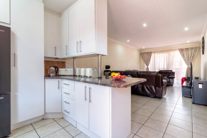 For Sale: Apartment in Krugersdorp North with 3 beds, secure parking, and outdoor space.