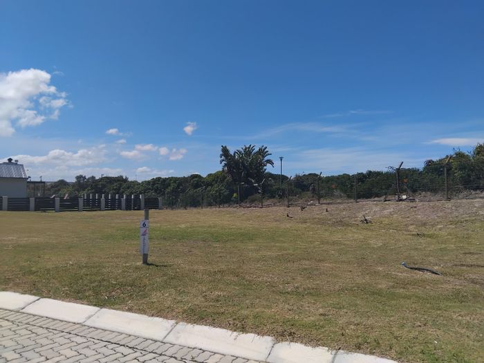 Vacant Land for Sale in Marina Martinique - Beach Access, Water Channels, Secure Community.